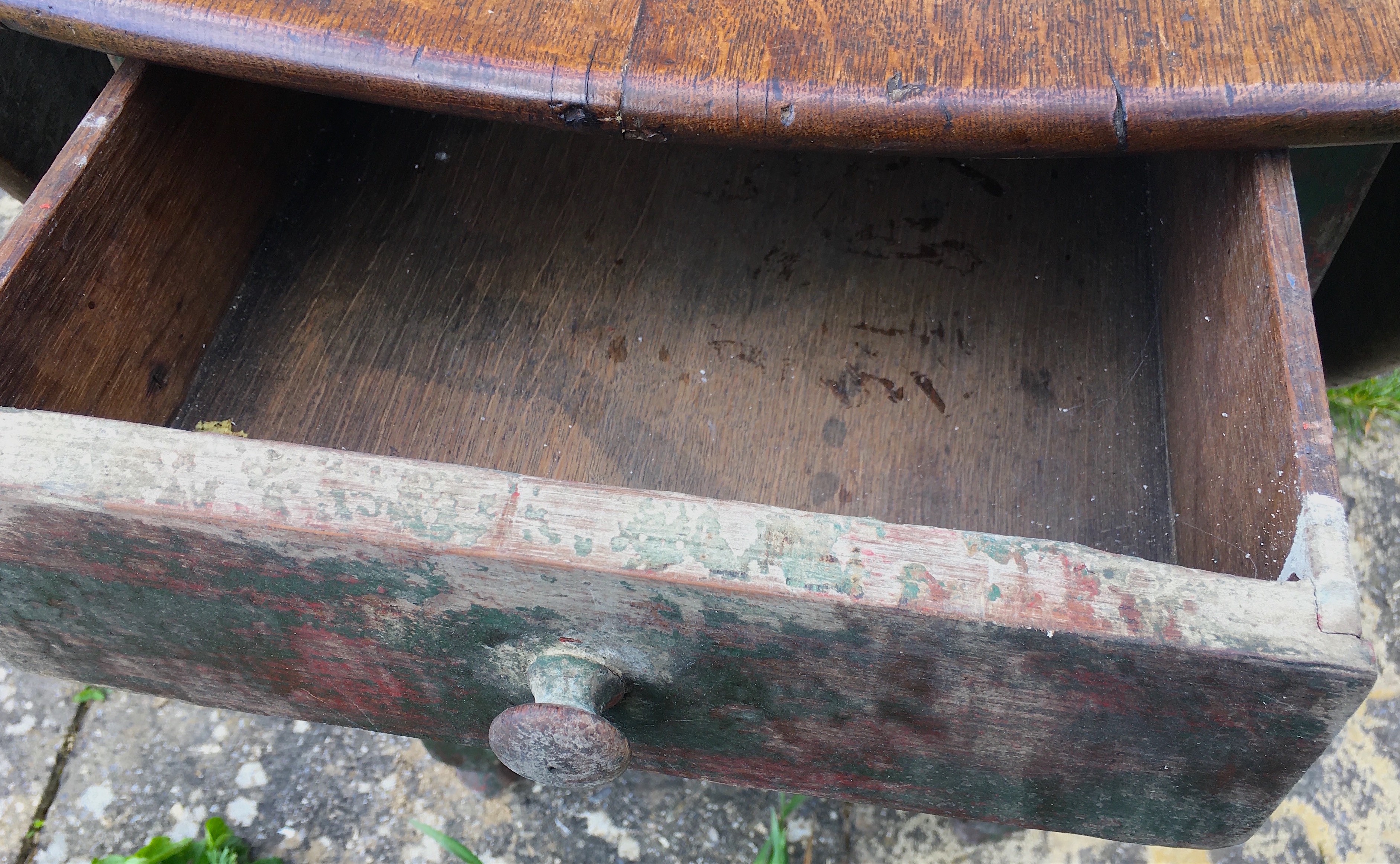 An 18th century oak gateleg dining table, the turned underframe with traces of old paint, length 123cm, depth extended 134cm, height 72cm *Please note the sale commences at 9am.